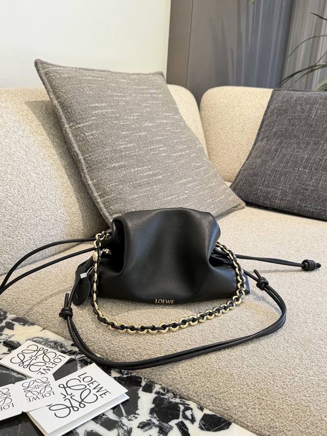 Genuine Leather The ultimate must-have bag of the year! The Flamenco purse is pe