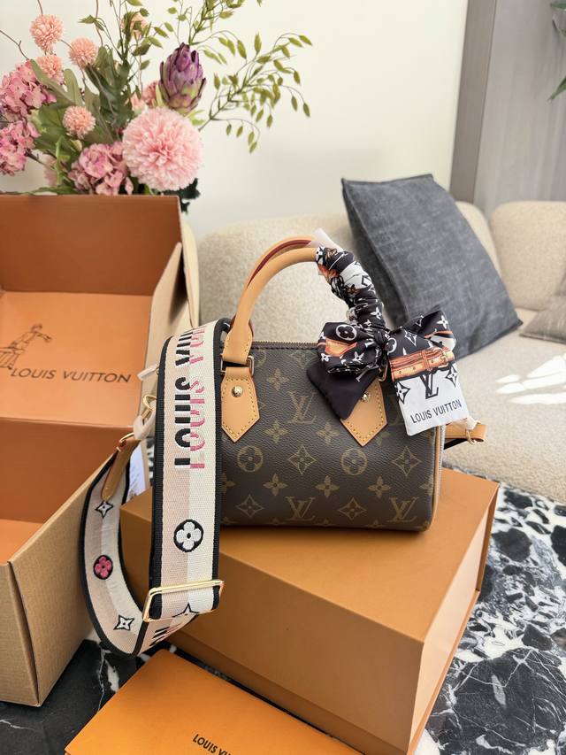 Lv Speedy 20 Pillow Bag The Lv Speedy 20 pillow bag features classic Monogram ca
