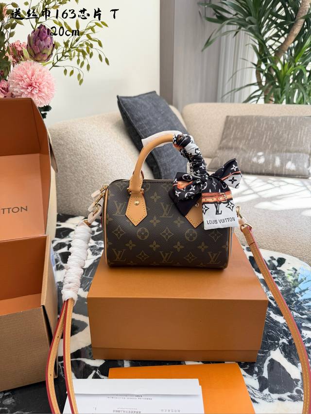 Lv Speedy 20 Pillow Bag The Lv Speedy 20 pillow bag features classic Monogram ca