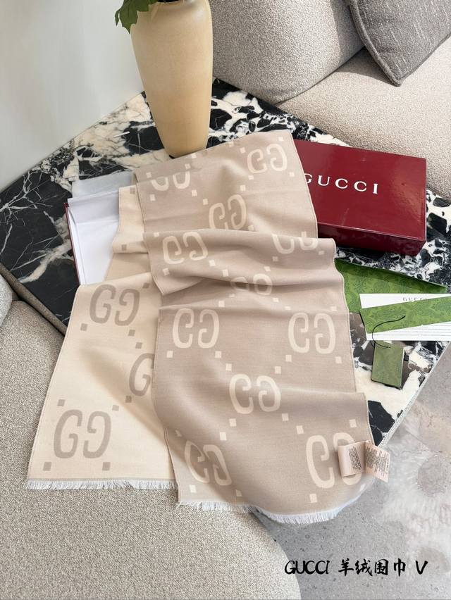 Gucci Gg Wool Scarf A classic Gucci Gg wool scarf, beige base with white double