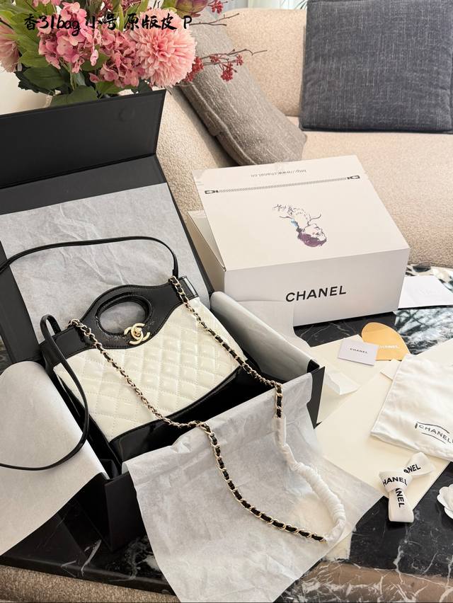 Chanel Mini 31 Bag in Panda Color, Leather. This Chanel Mini 31 Bag features a c