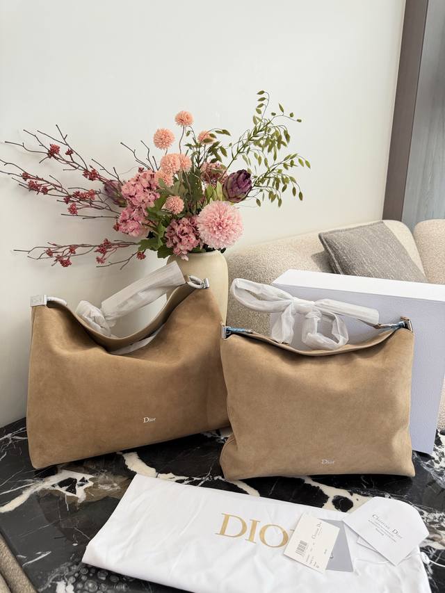 Original Suede Dior Cigale Bag This is a Dior Cigale Bag made of suede in a war