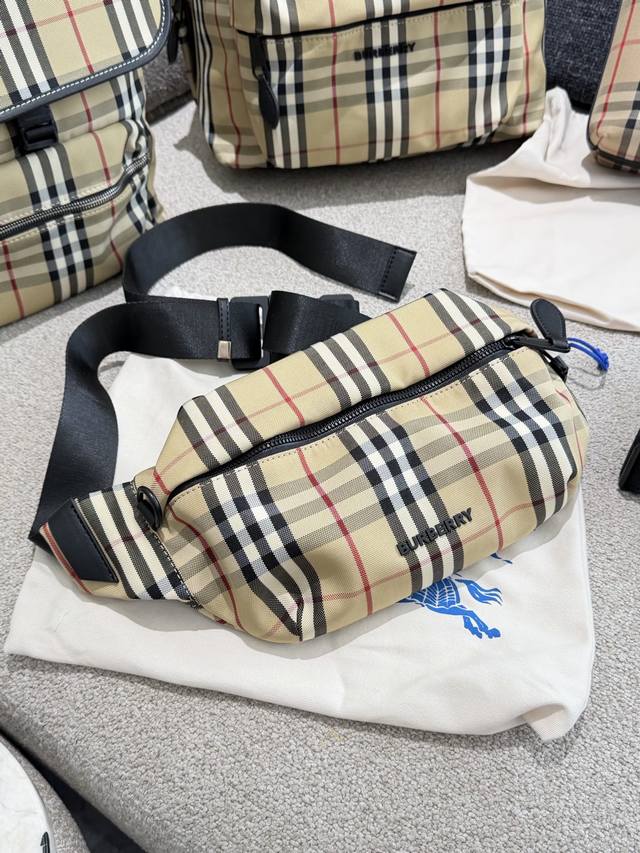 Burberry Classic Check Chest Bag/Waist Bag This Burberry camera bag features the
