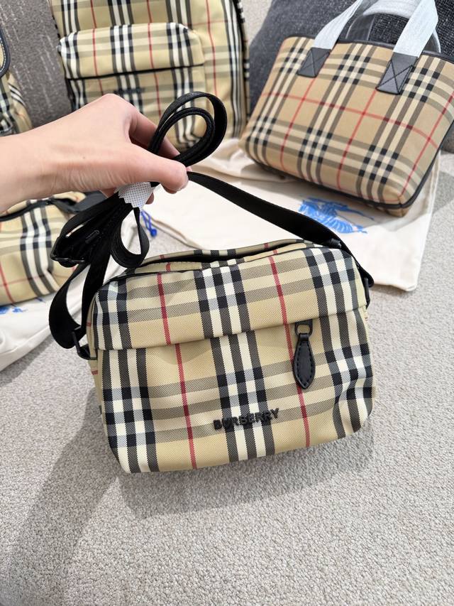 Burberry Classic Vintage Check Camera Bag This Burberry camera bag features the