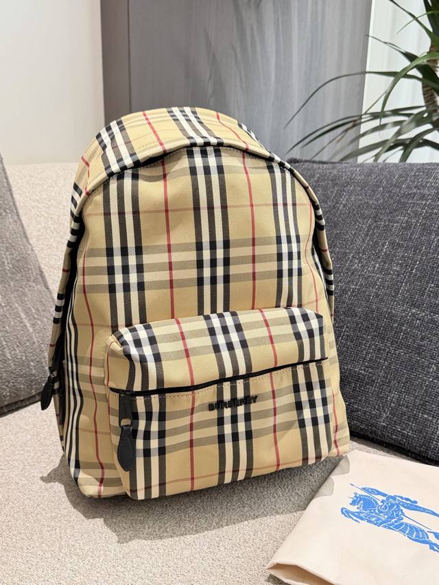 Burberry Classic Check Backpack Check out Burberry's check backpack, a timeless