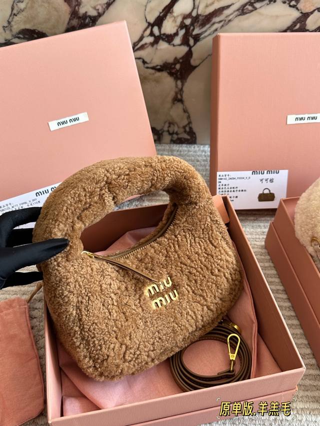 Original Sheepskin Hobo Crescent Bag Miu Miu is out and about in a blazing red!