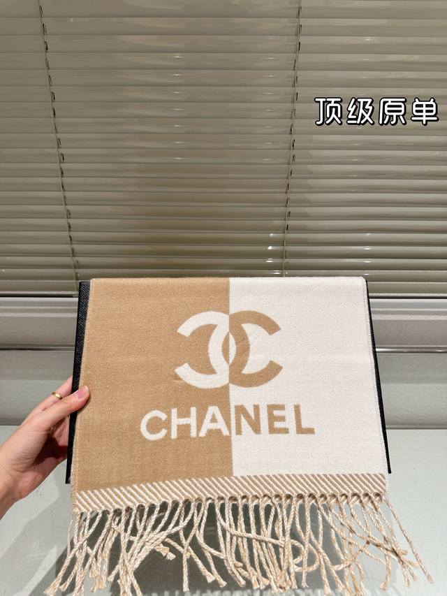 Chanel 24A two-tone scarf is here to cool you down! The colors are classic black