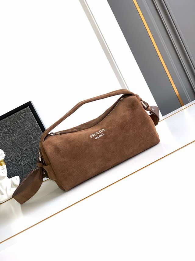 New Boston Suede Handbag. This stylish and compact Boston handbag draws inspira