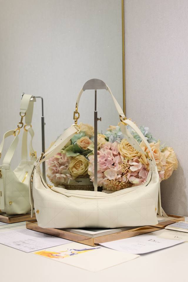 Medium D-Journey Handbag, White Plain Weave. This D-Journey handbag is a new ad