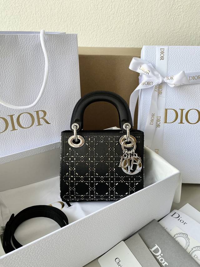 Dior Lady Dior three-compartment bag with black gunmetal silver clasp. Three-co