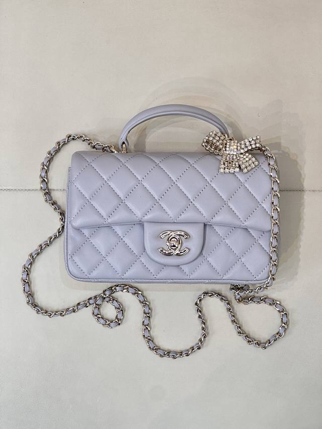 2431 Gray Lambskin Style A luxurious gray lambskin paired with vintage hardware