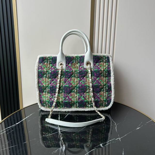 Chanel 25N Tweed Handbag The Chanel 25N tweed handbag is a limited edition from