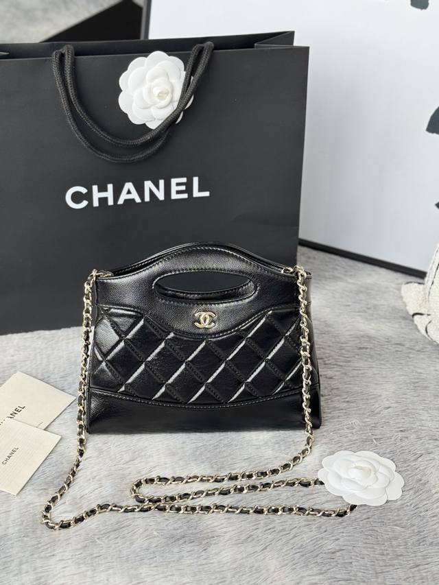 Black and light gold lambskin 24B's 31Bag Nano! Mini Size. Made of oil-waxed la