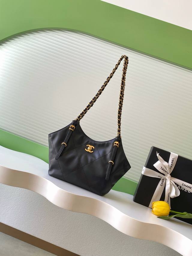 26C mini tote, made of soft calfskin, with a delicate and lightweight feel, perf