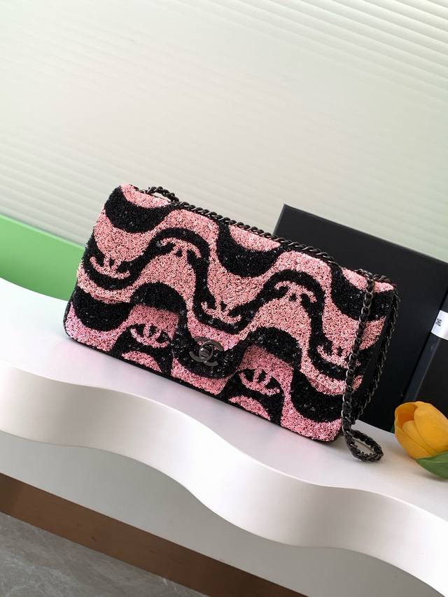 Top-tier original limited edition sequined black and pink wave design. I collect