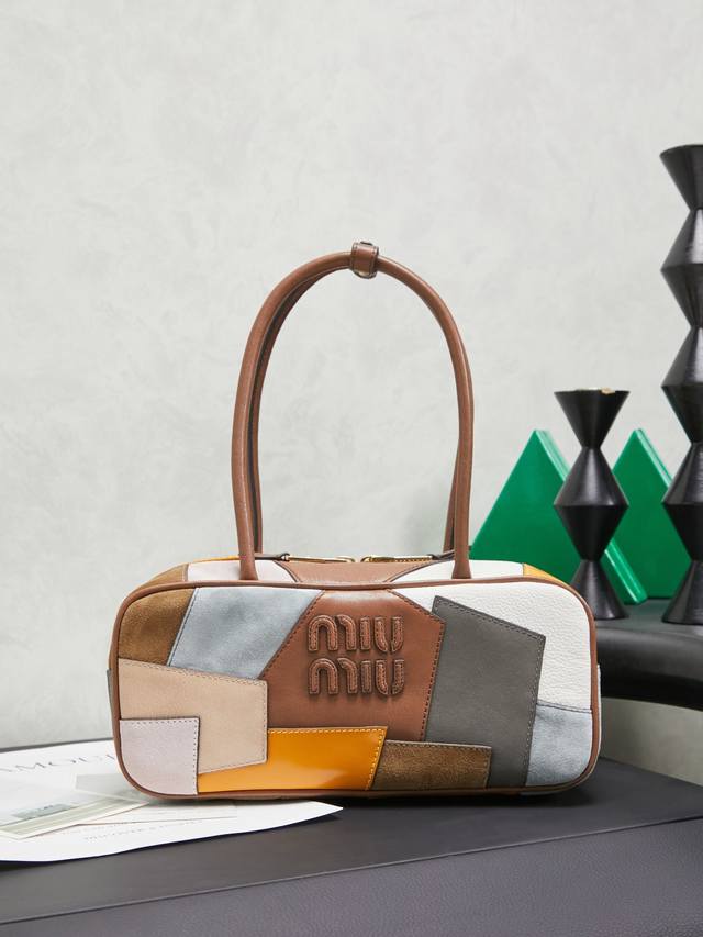 5Bb147: Miu's new patchwork bowling bag, handcrafted with various leathers, feat