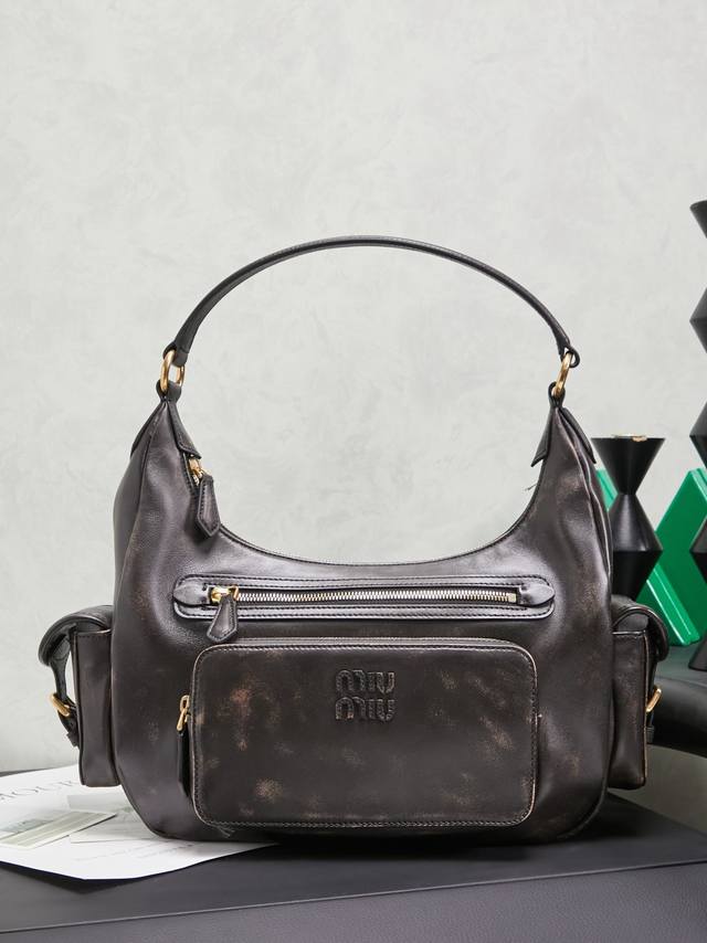 New Motorcycle Bag This Miu pocket bag is so spacious! It's a sold-out must-have