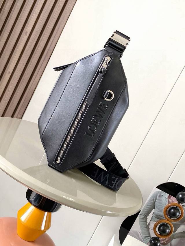 Original Leather Sling Bag (Classic Calfskin Leather) This compact Sling bag fea