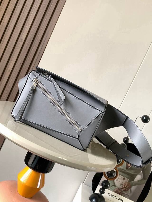 Original Leather Small Classic Cowhide Puzzle Waist Bag. The rectangular shape a