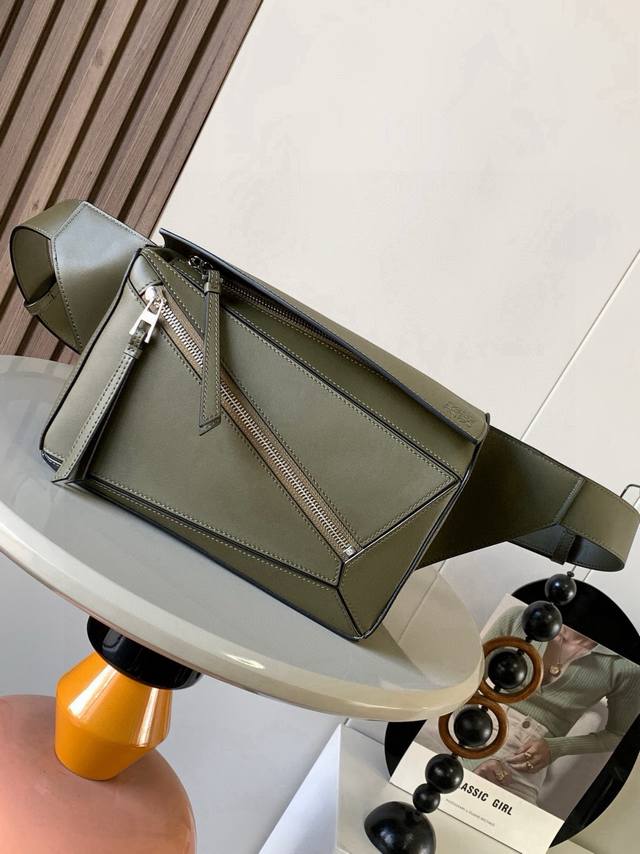 Original Leather Small Classic Cowhide Puzzle Waist Bag. The rectangular shape a