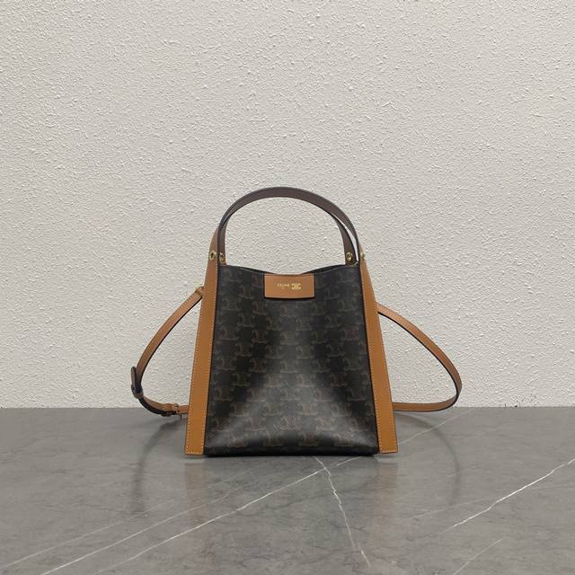 Authentic Product New Arrival: Cubo Handbag The Cubo handbag features a unique s