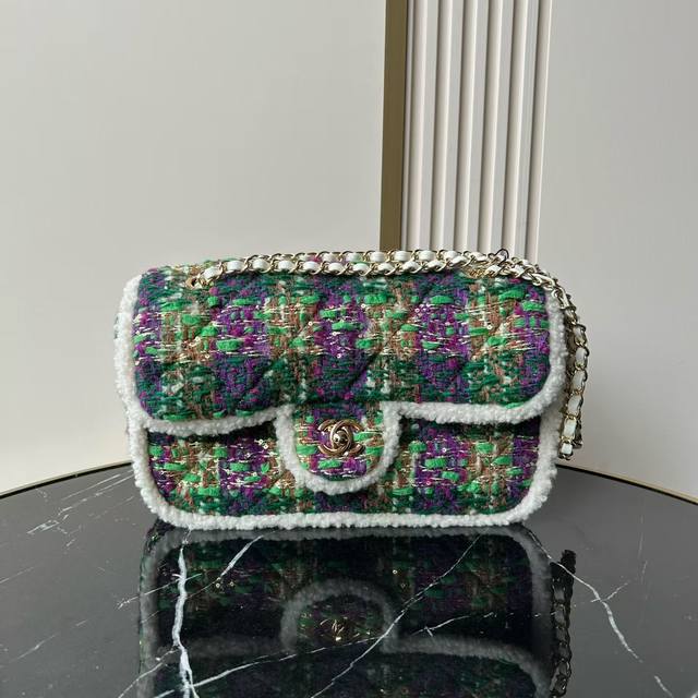 Chanel 25N Tweed Handbag This Chanel 25N tweed flap bag is a limited edition fro