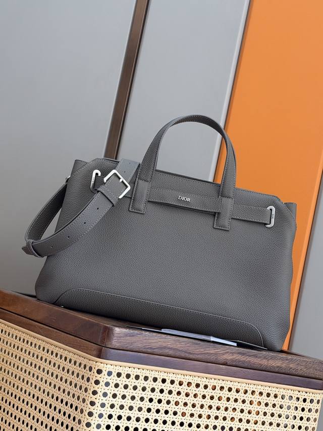 Authentic Product ( ) This Dior Normandie handbag seamlessly blends practical de