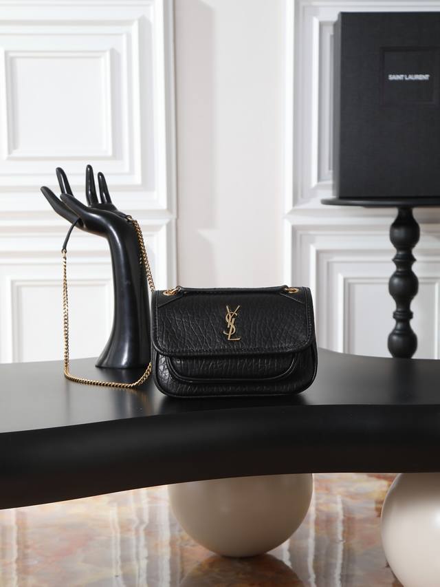 Black elephant print with gold hardware, 18cm. The newest member of the Niki fa