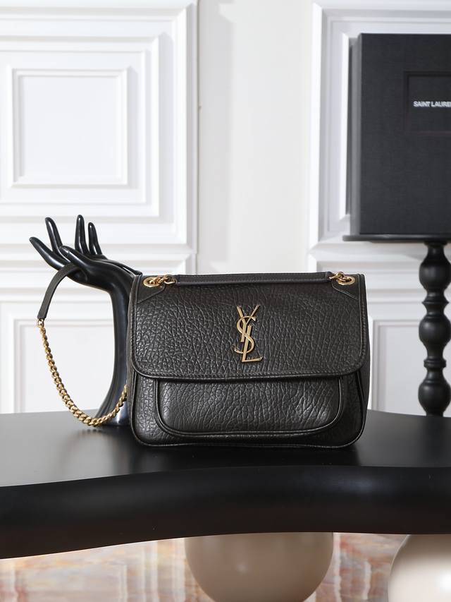 Green elephant print with gold hardware, 28cm. The Niki bag is incredibly cool!