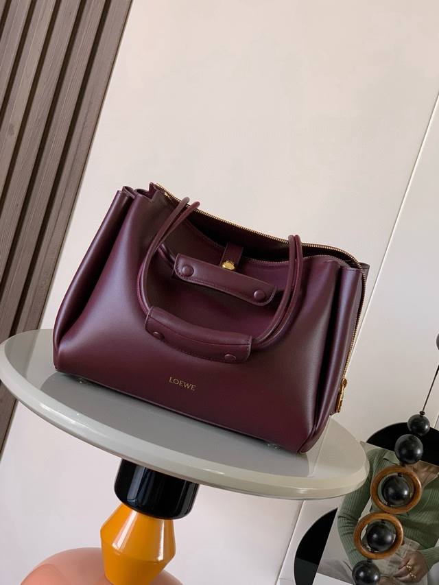 Original Leather Madrid Medium Handbag in Soft Calfskin. The Madrid features a s