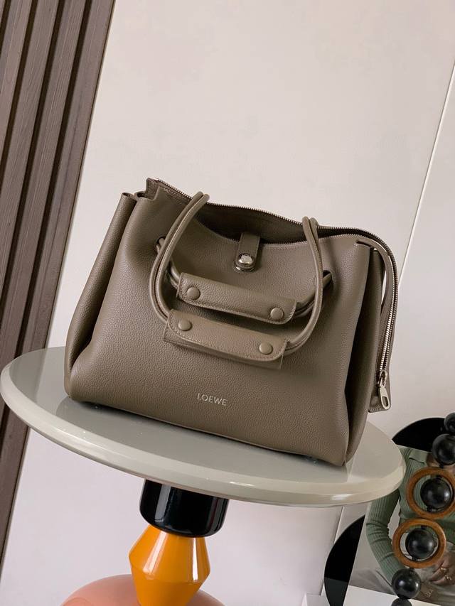 Original Leather Madrid Medium Handbag in Soft Calfskin. The Madrid features a s