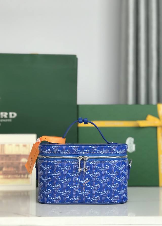 Authentic Muse Mini Makeup Bag continues the design elements of the small makeup