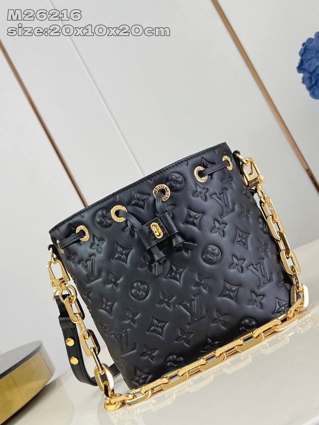 Original Leather Exclusive Real Shot M26216 Black Bucket Handbag is crafted from