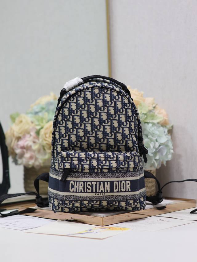 Authentic, High-Quality Diortravel Small Blue Fabric Backpack. This Diortravel