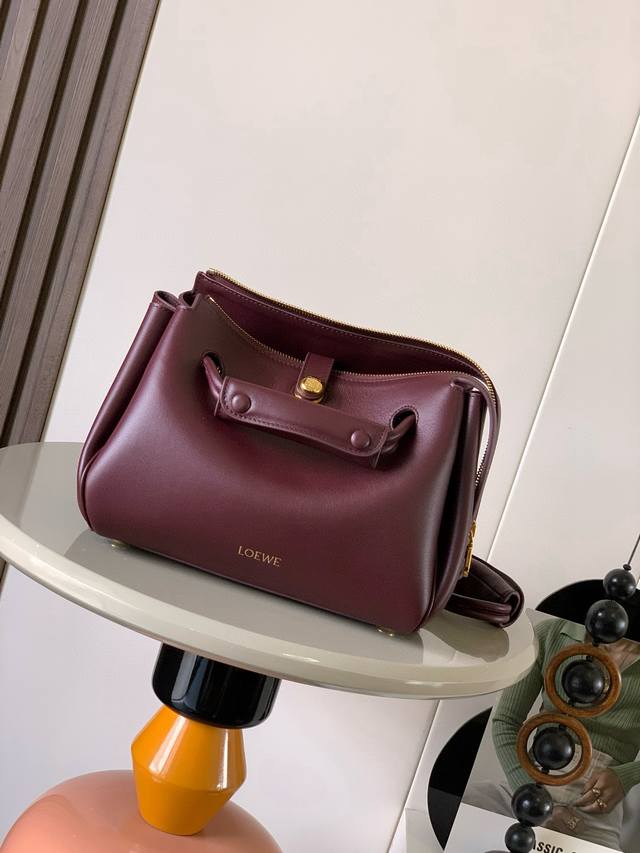 Original Leather Small Soft Calfskin Madrid Handbag. The Madrid features a soft