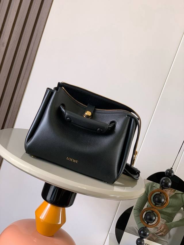 Original Leather Small Soft Calfskin Madrid Handbag. The Madrid features a soft,