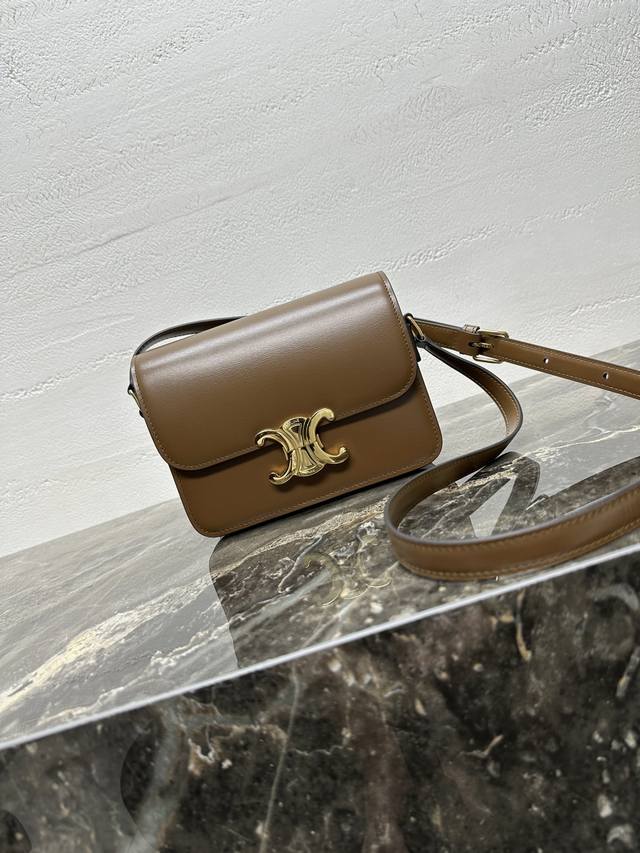 Authentic Teen Triomphe Calfskin Handbag with All-Steel Hardware. This small Tri