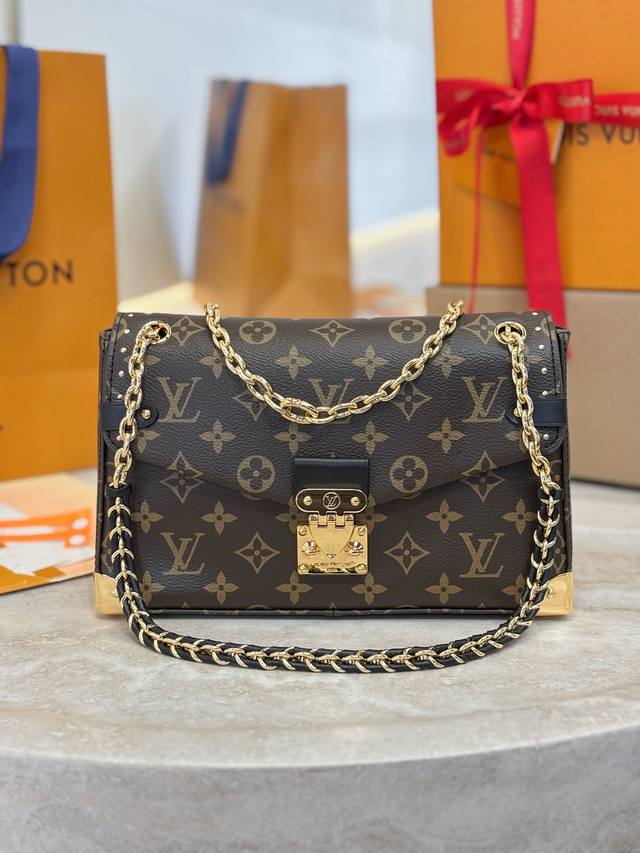 Trunkie Messenger Bag M14526 The Trunkie handbag combines Monogram canvas and me