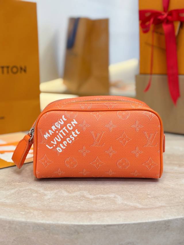 Dopp Kit Mini Toilet Bag M27158 Orange This Dopp Kit mini toilet bag is made of