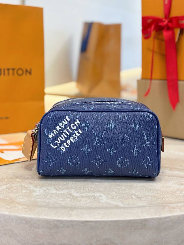 Dopp Kit Mini Toilet Bag M26872 Blue This Dopp Kit mini toilet bag is made of br