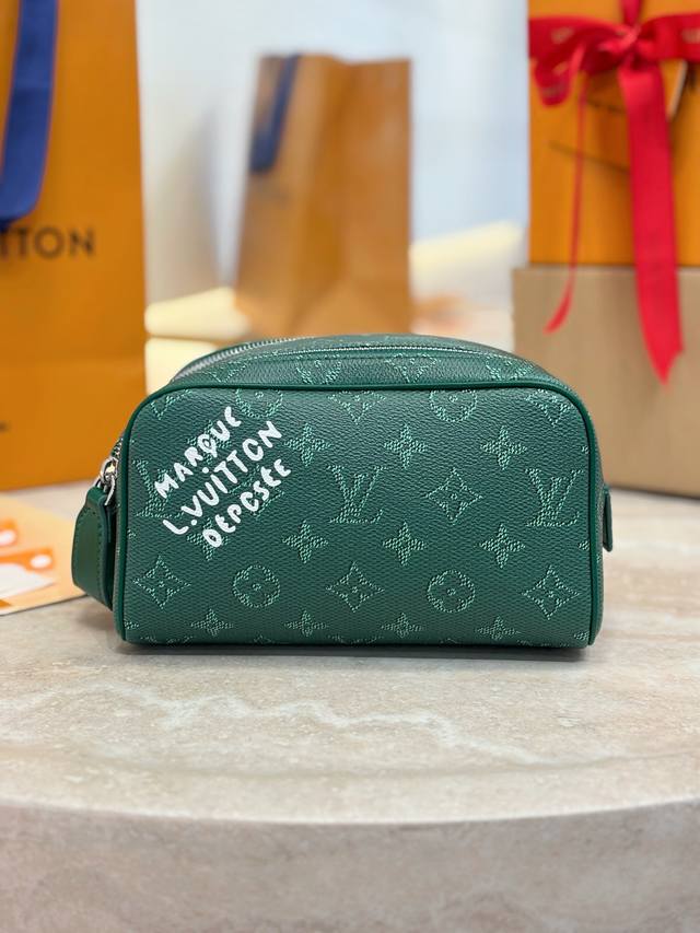 Dopp Kit Mini Toilet Bag M26871 Green This Dopp Kit mini toilet bag is made of b