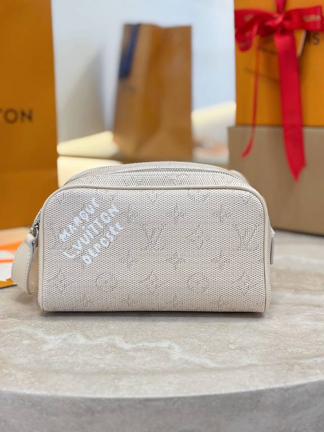 Dopp Kit Mini Toilet Bag M27158 White This Dopp Kit mini toilet bag is made of b