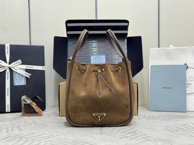 New Bucket Bag 1Be087 Suede This frosted bucket bag is made of imported suede an