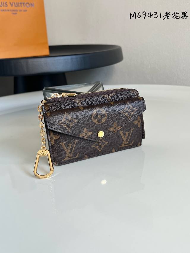 Chip-enabled M69431 Black Original Multi-functional Zipper Card Holder. Made wi