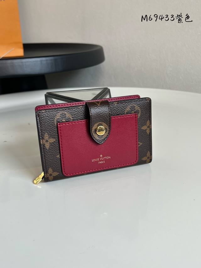 Chip Version M69433 Monogram Purple Juliette Wallet features a chic front pocke