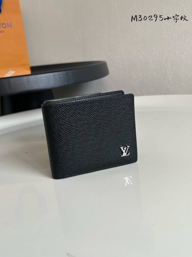 Chip Version M30295 Cross-Grain Multiple Wallet is crafted from classic embosse