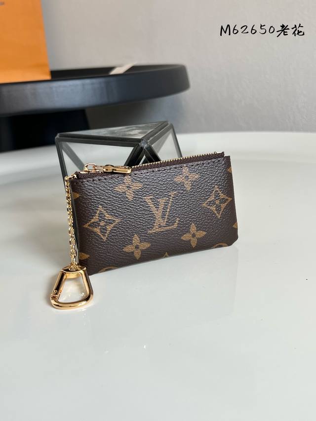 Chip version M62650 monogram! This wallet evokes images of a sunny beach. It fe