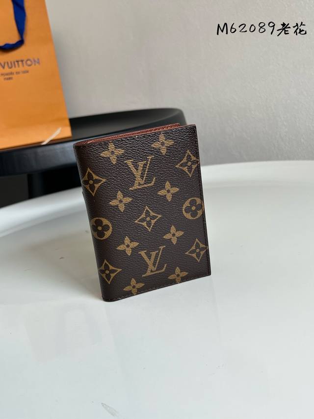 Chip Version M62089 Monogram Passport Holder! The perfect companion for stylish