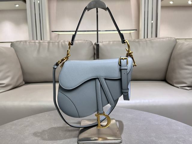 The large, hazy blue saddle bag with shoulder strap is the king of kings, its s