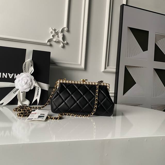 Chanel 26C Pearl Evening Bag As5912. Exuding a luxurious feel, this bag features